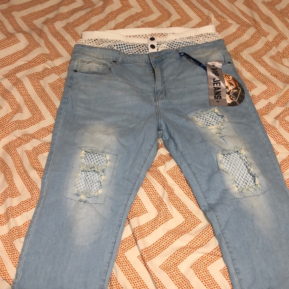 Light blue jeans with white fish nets